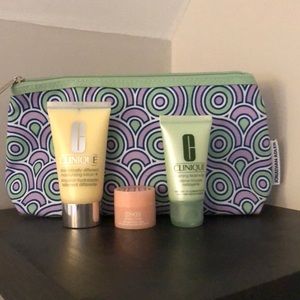 Clinique Jonathan Adler makeup bag with cleanser, moisturizer and eye cream.